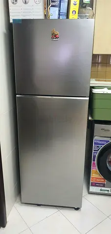 Stainless Steel Double-Door Refrigerator in Good Condition