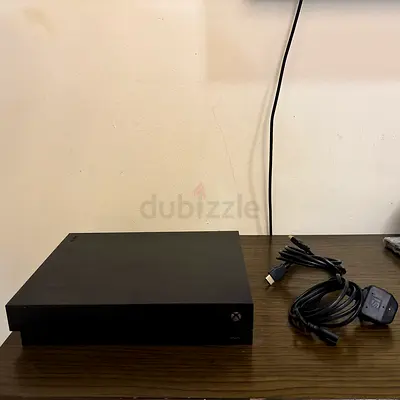Xbox One X console with power and HDMI cables - Good working condition