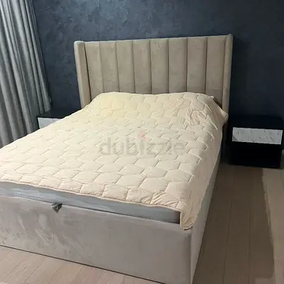 Queen upholstered bed with storage and padded headboard - light grey