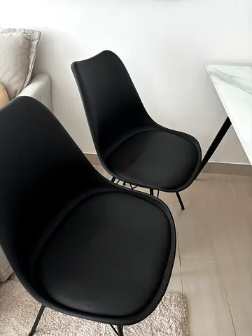 Small white marble-effect dining table with 4 chairs