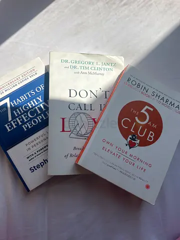 Collection of self-help books — The 5 AM Club, Don’t Call It Love, and The 7 Habits