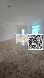 Three-bedroom apartment with a living room in Al Nuaimiya, including a maid's room, laundry room