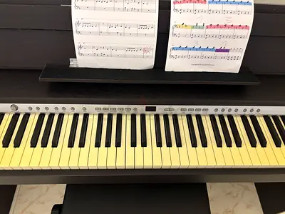 Used digital piano/keyboard with stand and music rest - well maintained