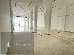 HUGE SIZE LUXURY SHOP WITH WASHROOM VERY PRIME LOCATION FRONT MAIN ROAD READY TO MOVE JUST 215K