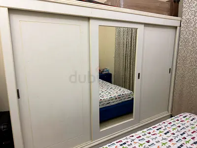 White cupboards  White vanity dressing table set with mirror and tall chest - good condition