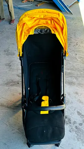 Lightweight yellow and black standard stroller - good condition