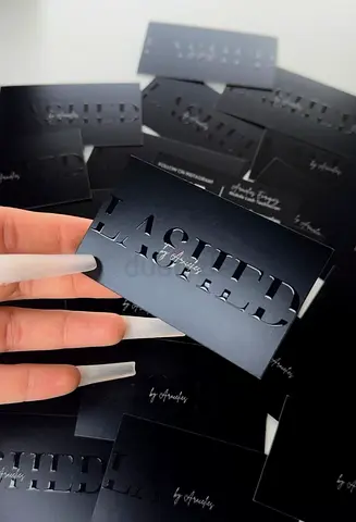 Lot of custom laser-cut brand business cards (black metal-look)
