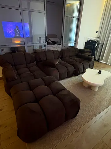 Large dark brown modular sectional sofa with chaise — comfortable family size