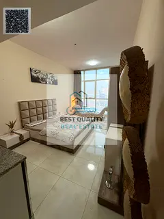 Studio apartment for monthly rent, including bills, with a panoramic street view.