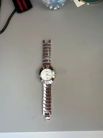 Silver stainless steel wristwatch - gently used