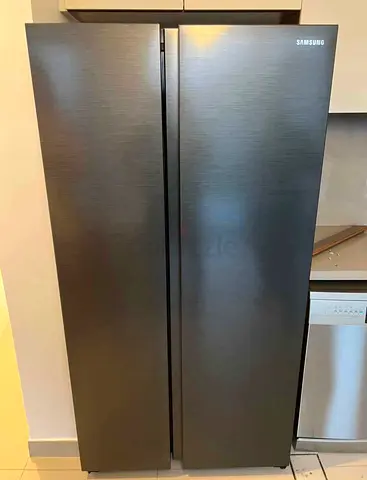 Samsung side by side refrigerator neat and clean excellent condition perfect working