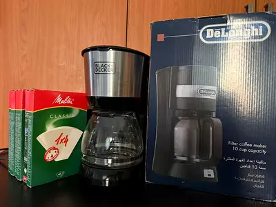 Black  Decker Drip Coffee Maker with Filters (10-cup capacity, DeLonghi boxed unit pictured)