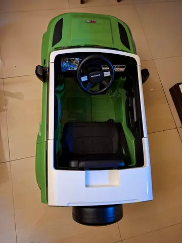 Kids electric ride-on car (green) - single seat, good condition