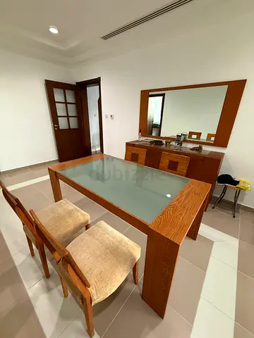 Oak dining table with glass top and 4 chairs - excellent condition with serving cabinet  mirror