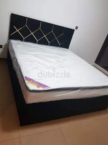 Queen bed frame with mattress - modern black headboard