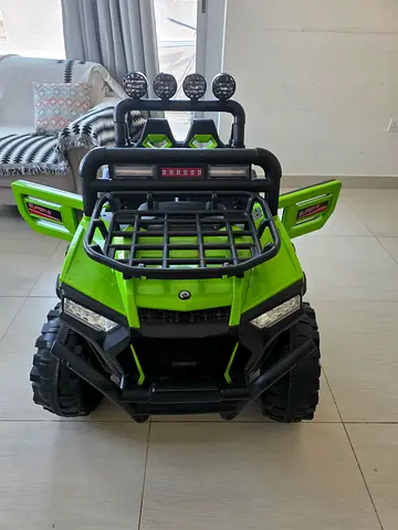 Green Electric Ride Car — Good Condition