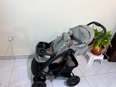 Light grey double stroller (twin/side-by-side) in good condition