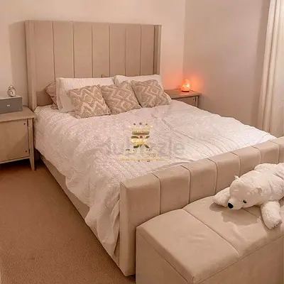 Beige Upholstered Double Bed with Headboard and Storage Bench