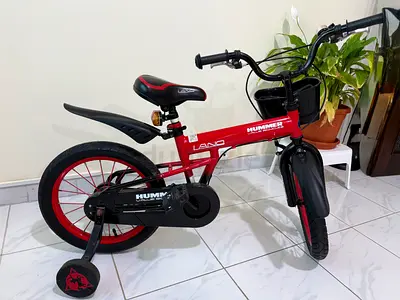 HUMMER red kids bicycle with training wheels and basket