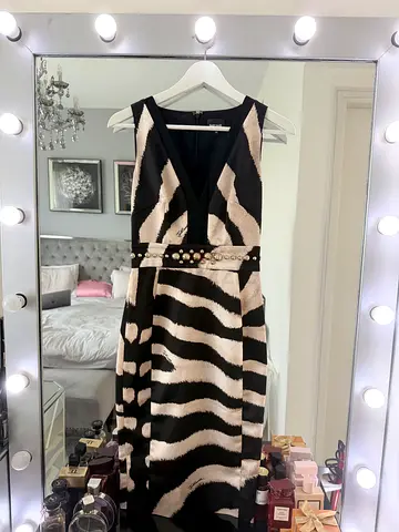 Just Cavalli size XS 100dhs
