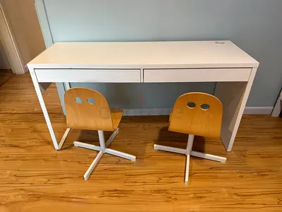 White double study desk with two kids swivel chairs