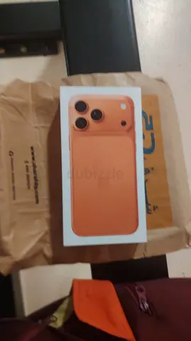 Apple iPhone (boxed) - Coral/Peach color, unused condition