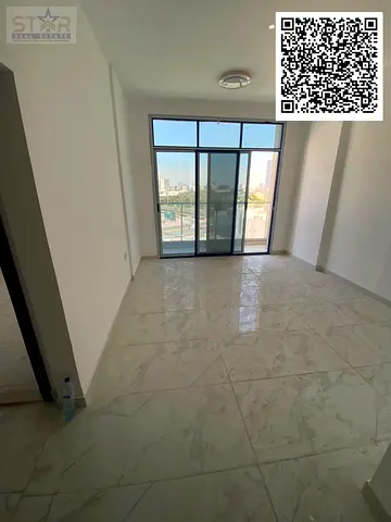 New building, first occupant, one-bedroom apartment with a living room, one bathroom, with a balcony, Al Rashidiya 3, opposite the Ladies' Park