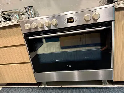 Beko Stainless Steel Gas Cooker with Electric Oven - Good Condition