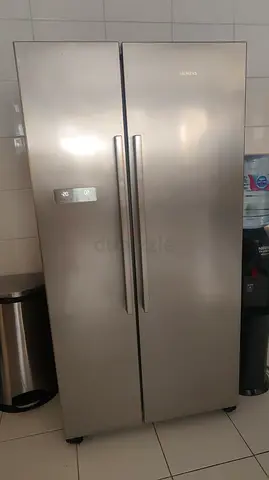 Siemens brand iQ700 Side by Side Refrigerator with digital display screen