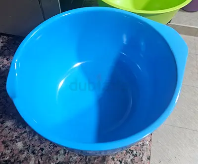 Blue plastic mixing bowl, used, good condition