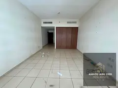 Annual rental apartment with two master bedrooms and a spacious living room in Ajman One Towers, fea