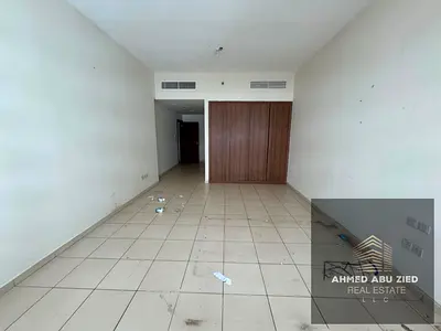 للإيجار السنوي شقة غرفتين وصالة واسعة في أبراج عجمان ون الراشدية، بلكونة كبيرة ومطبخ أمريكي وغرفة غسيل وستور مع باركن وجيم ومسبح