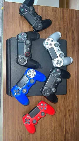 PS4 Slim with 7 DualShock 4 Controllers — Good Working Condition