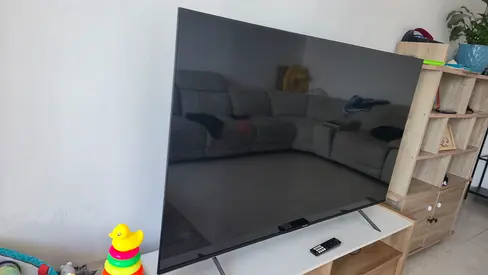 65-inch UHD 4K Smart TV in good working condition with Low-Wide Media Console