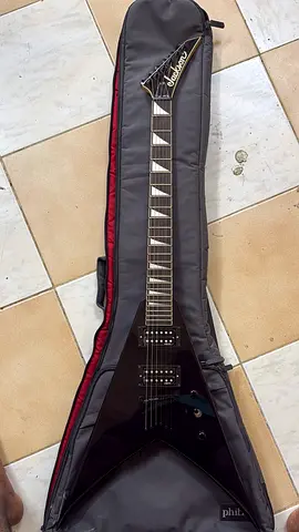 Jackson V-shaped Electric Guitar with Gig Bag ( Pickup upgraded with Schecter)