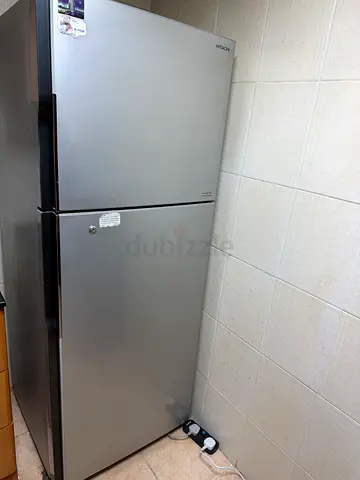 Hitachi double-door refrigerator in good working condition,original price 2500