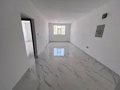 Al Muwaihat 3 - Two master bedrooms, spacious living room, two bathrooms, fully lit apartment with c
