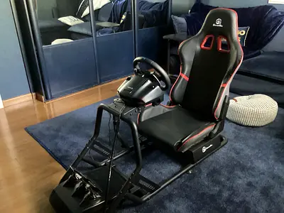 Complete Racing Simulator Rig with Wheel, Pedals, gearbox, Seat, and additional PS5 controller