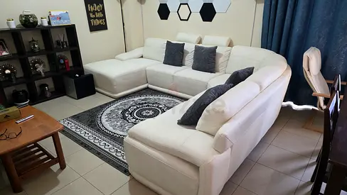 White L-shaped Leather Sofa - Good Condition, Comfortable Corner Sofa