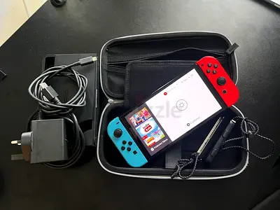 Nintendo Switch OLED + DOBE 18-in-1 Sports Accessory Kit
