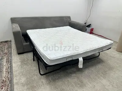 Like new condition cratebarrel three seater sofa bed