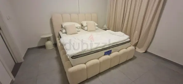 Beige Upholstered Queen Bed Frame with Headboard and Footboard