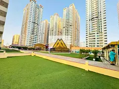 For rent in Ajman One Towers, Al Rashidiya 3: spacious apartment with separate kitchen, central AC,