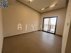 2BR Hall for Annual Rent in Al Alia, Ajman. 1 Month Free, 2 Master BRs, 3 Baths, Balcony, Wardrobes,