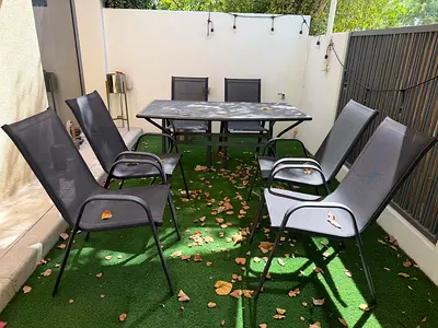 Outdoor Dining Set with 6 Mesh Chairs and Table