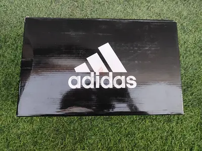 Adidas sneakers in original box (new/unused) - size not specified
