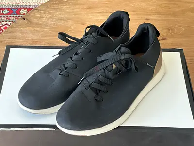 Mens black leather casual sneakers - size not specified, lightly used