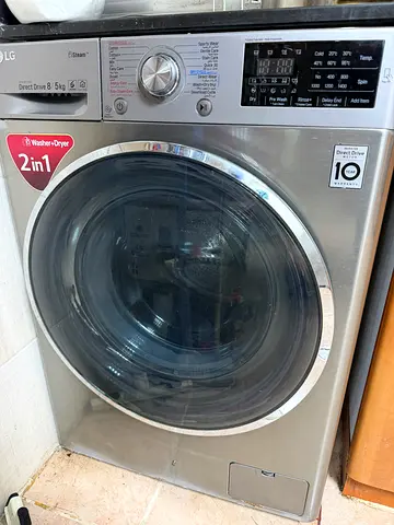 LG Front Load Washer Dryer 8/5 kg Combo - Stainless Steel, Good Working Condition,origina price 2000