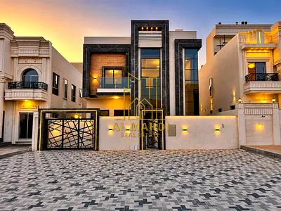 Luxury villa in Al Helio 1 area, registration fees included, in a prime location close to all amenities. Excellent finishing, the best in Ajman.