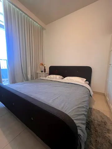 King size bed with mattress and bedsides